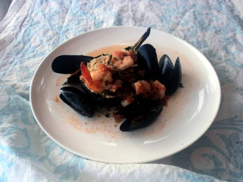 Melanzane ripiene di riso in guazzetto di mare